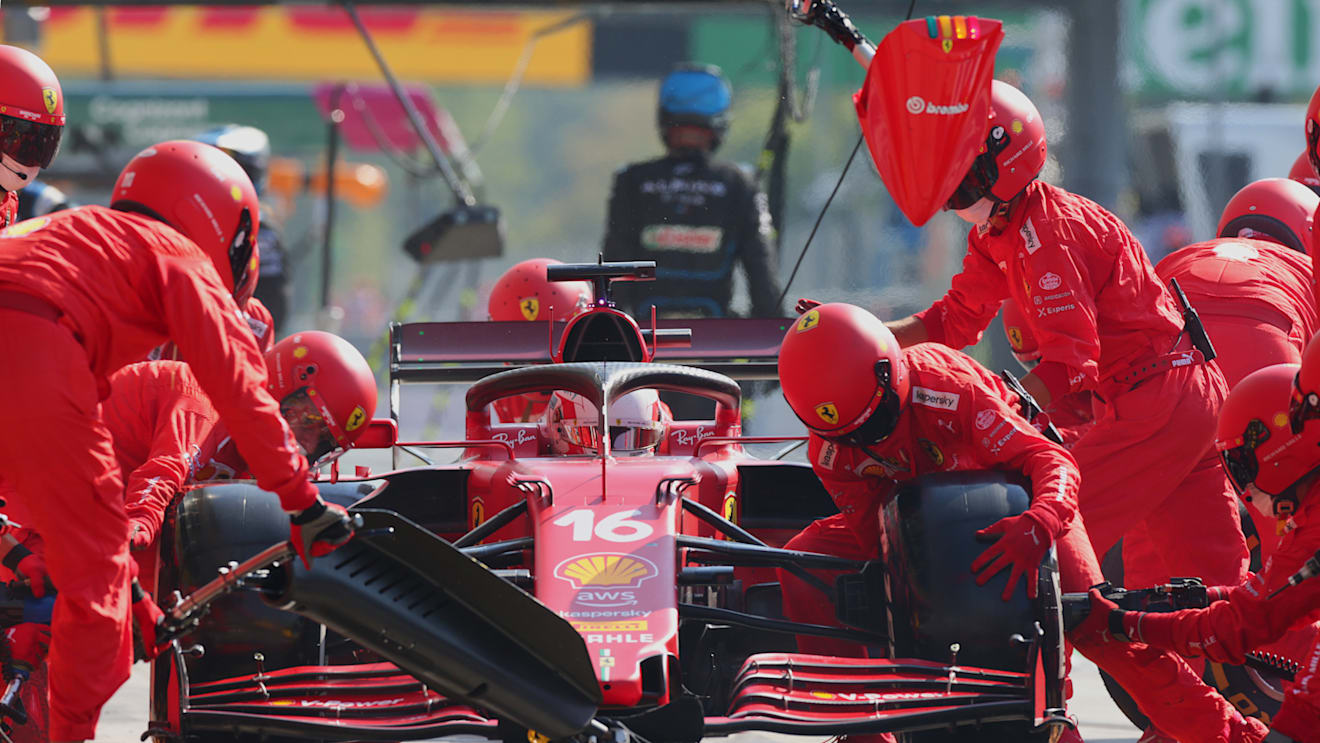 MONZA, ITALY - SEPTEMBER 12: Charles Leclerc of Monaco driving the (16) Scuderia Ferrari SF21 makes a pitstop during the F1 Grand Prix of Italy at Autodromo di Monza on September 12, 2021 in Monza, Italy. (Photo by Peter Fox/Getty Images)