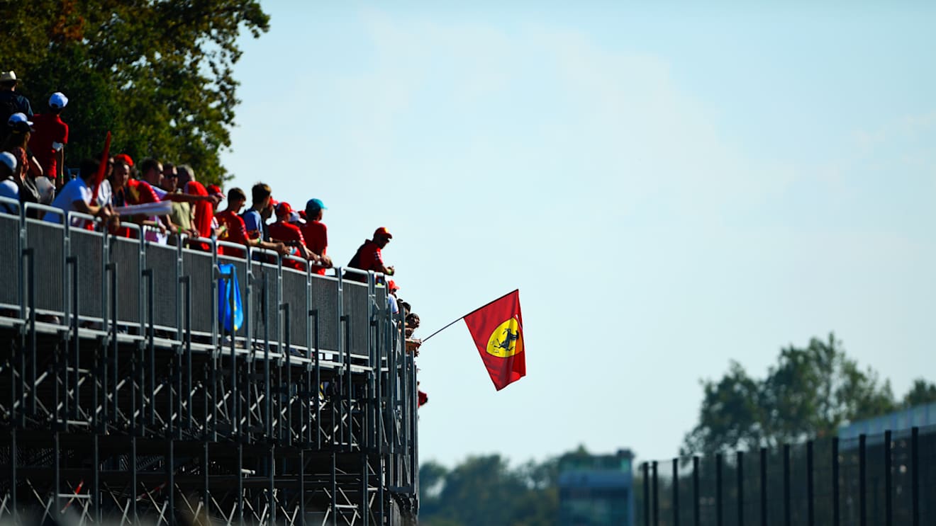 MONZA, ITALY - SEPTEMBER 12: Ferrari fans show their support during the F1 Grand Prix of Italy at Autodromo di Monza on September 12, 2021 in Monza, Italy. (Photo by Rudy Carezzevoli/Getty Images)