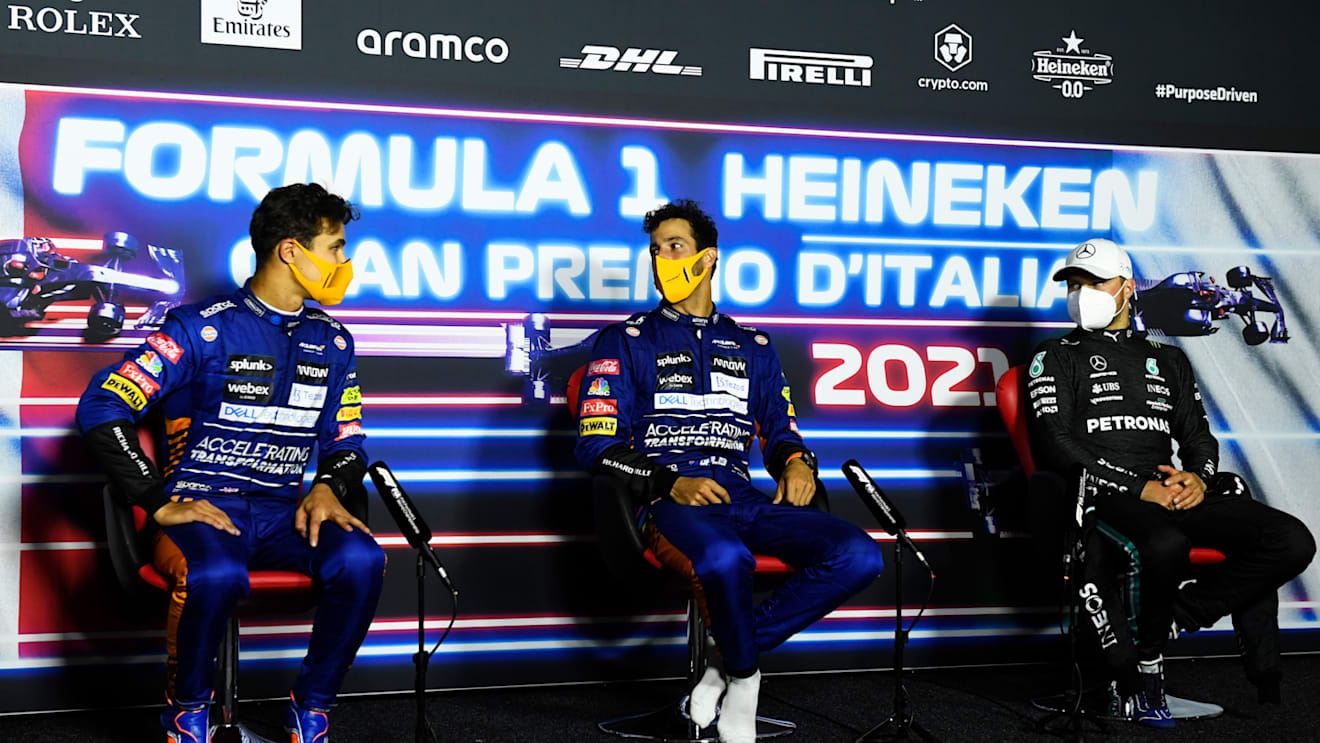 MONZA, ITALY - SEPTEMBER 12: Race winner Daniel Ricciardo of Australia and McLaren F1, second placed Lando Norris of Great Britain and McLaren F1 and third placed Valtteri Bottas of Finland and Mercedes GP talk in the press conference after the F1 Grand Prix of Italy at Autodromo di Monza on September 12, 2021 in Monza, Italy. (Photo by Rudy Carezzevoli/Getty Images)