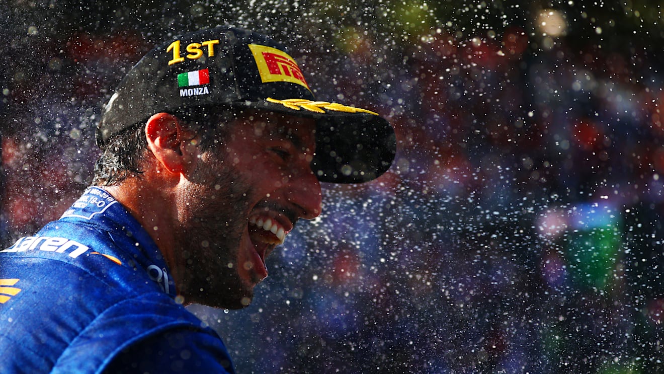 MONZA, ITALY - SEPTEMBER 12: Race winner Daniel Ricciardo of Australia and McLaren F1 celebrates on the podium during the F1 Grand Prix of Italy at Autodromo di Monza on September 12, 2021 in Monza, Italy. (Photo by Dan Istitene - Formula 1/Formula 1 via Getty Images)