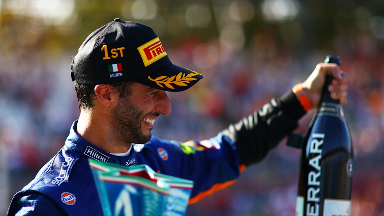 MONZA, ITALY - SEPTEMBER 12: Race winner Daniel Ricciardo of Australia and McLaren F1 celebrates on the podium during the F1 Grand Prix of Italy at Autodromo di Monza on September 12, 2021 in Monza, Italy. (Photo by Dan Istitene - Formula 1/Formula 1 via Getty Images)