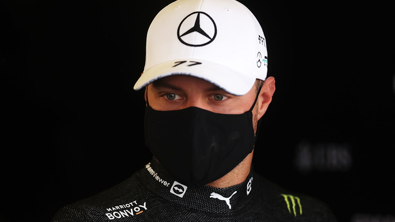 MEXICO CITY, MEXICO - NOVEMBER 05: Valtteri Bottas of Finland and Mercedes GP looks on in the garage during practice ahead of the F1 Grand Prix of Mexico at Autodromo Hermanos Rodriguez on November 05, 2021 in Mexico City, Mexico. (Photo by Lars Baron/Getty Images)