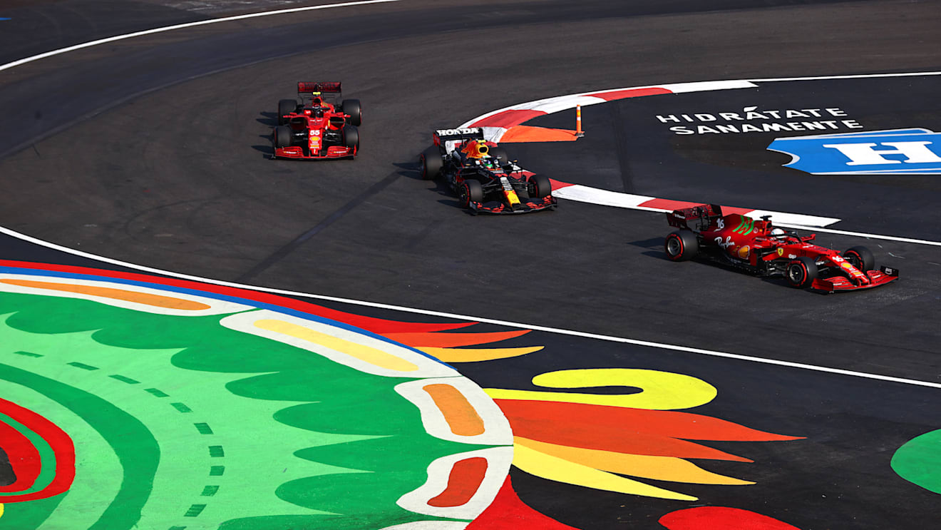 MEXICO CITY, MEXICO - NOVEMBER 05: Charles Leclerc of Monaco driving the (16) Scuderia Ferrari SF21 leads Sergio Perez of Mexico driving the (11) Red Bull Racing RB16B Honda and Carlos Sainz of Spain driving the (55) Scuderia Ferrari SF21 during practice ahead of the F1 Grand Prix of Mexico at Autodromo Hermanos Rodriguez on November 05, 2021 in Mexico City, Mexico. (Photo by Mark Thompson/Getty Images)