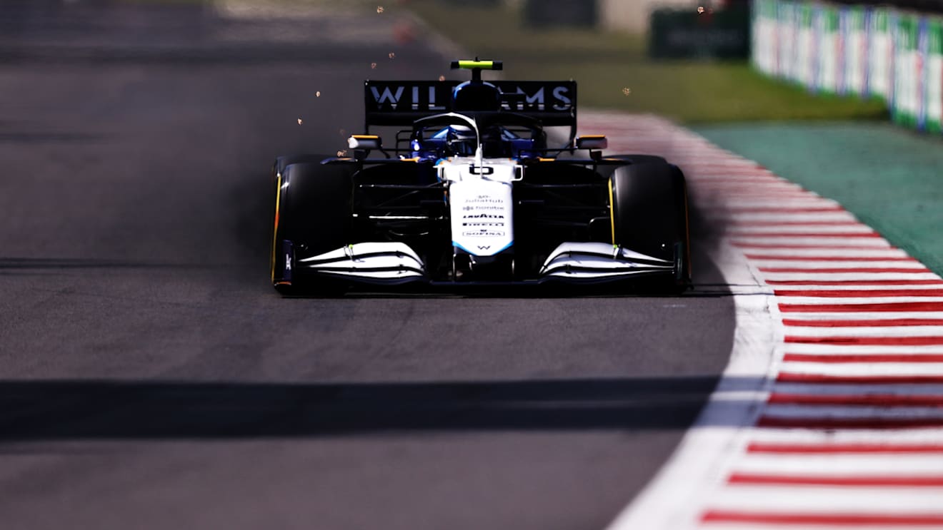 MEXICO CITY, MEXICO - NOVEMBER 06: Brake dust pours from the front brakes of Nicholas Latifi of Canada driving the (6) Williams Racing FW43B Mercedes during qualifying ahead of the F1 Grand Prix of Mexico at Autodromo Hermanos Rodriguez on November 06, 2021 in Mexico City, Mexico. (Photo by Lars Baron/Getty Images)