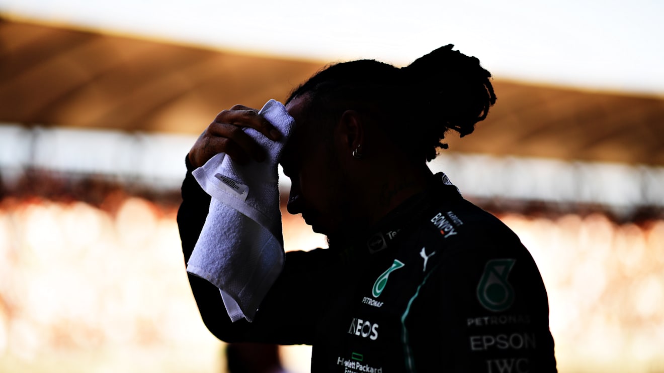 MEXICO CITY, MEXICO - NOVEMBER 06: Second place qualifier Lewis Hamilton of Great Britain and Mercedes GP looks on in parc ferme during qualifying ahead of the F1 Grand Prix of Mexico at Autodromo Hermanos Rodriguez on November 06, 2021 in Mexico City, Mexico. (Photo by Mario Renzi - Formula 1/Formula 1 via Getty Images)