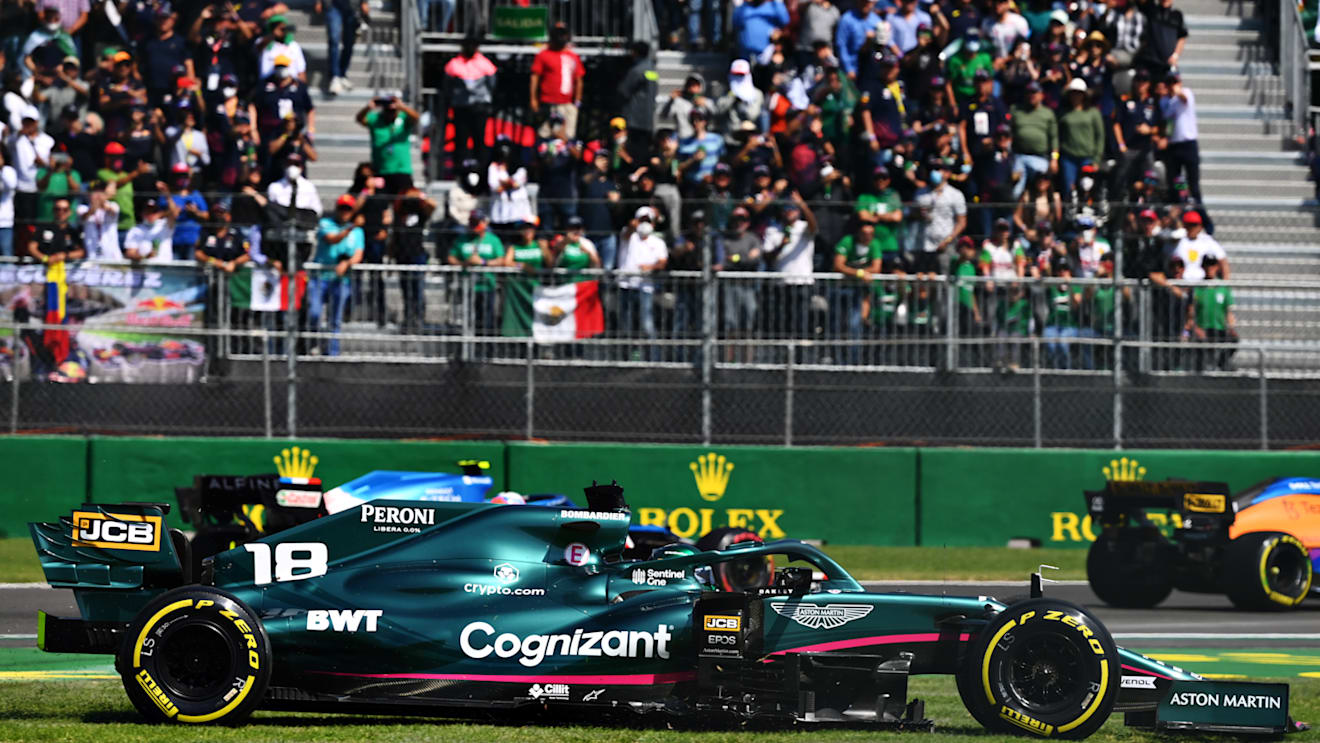 MEXICO CITY, MEXICO - NOVEMBER 07: Lance Stroll of Canada driving the (18) Aston Martin AMR21 Mercedes runs wide during the F1 Grand Prix of Mexico at Autodromo Hermanos Rodriguez on November 07, 2021 in Mexico City, Mexico. (Photo by Clive Mason/Getty Images)