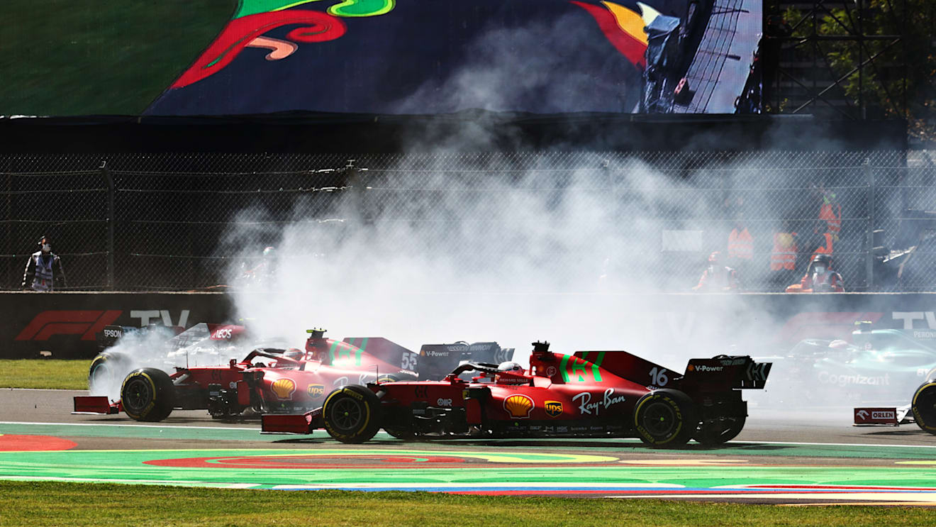 MEXICO CITY, MEXICO - NOVEMBER 07: Carlos Sainz of Spain driving the (55) Scuderia Ferrari SF21 and Charles Leclerc of Monaco driving the (16) Scuderia Ferrari SF21 at the start during the F1 Grand Prix of Mexico at Autodromo Hermanos Rodriguez on November 07, 2021 in Mexico City, Mexico. (Photo by Mark Thompson/Getty Images)