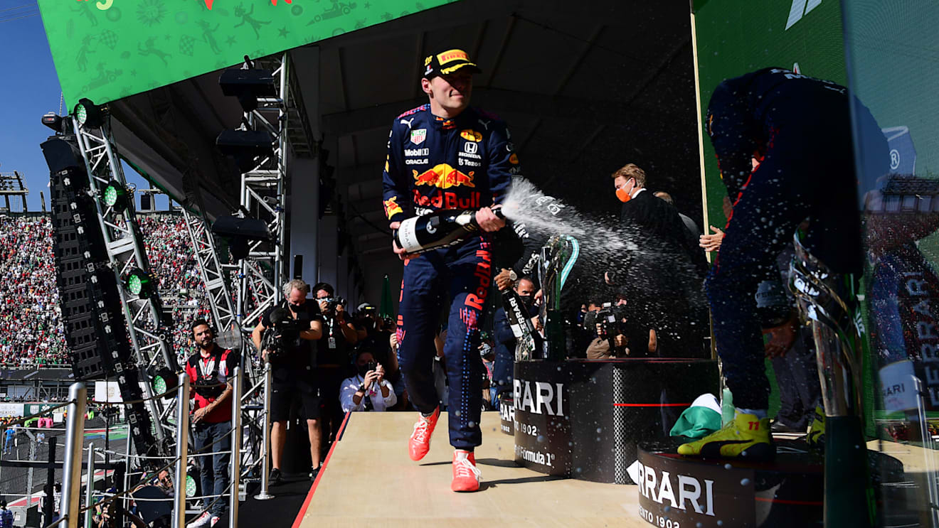 MEXICO CITY, MEXICO - NOVEMBER 07: Race winner Max Verstappen of Netherlands and Red Bull Racing celebrates on the podium during the F1 Grand Prix of Mexico at Autodromo Hermanos Rodriguez on November 07, 2021 in Mexico City, Mexico. (Photo by Mario Renzi - Formula 1/Formula 1 via Getty Images)