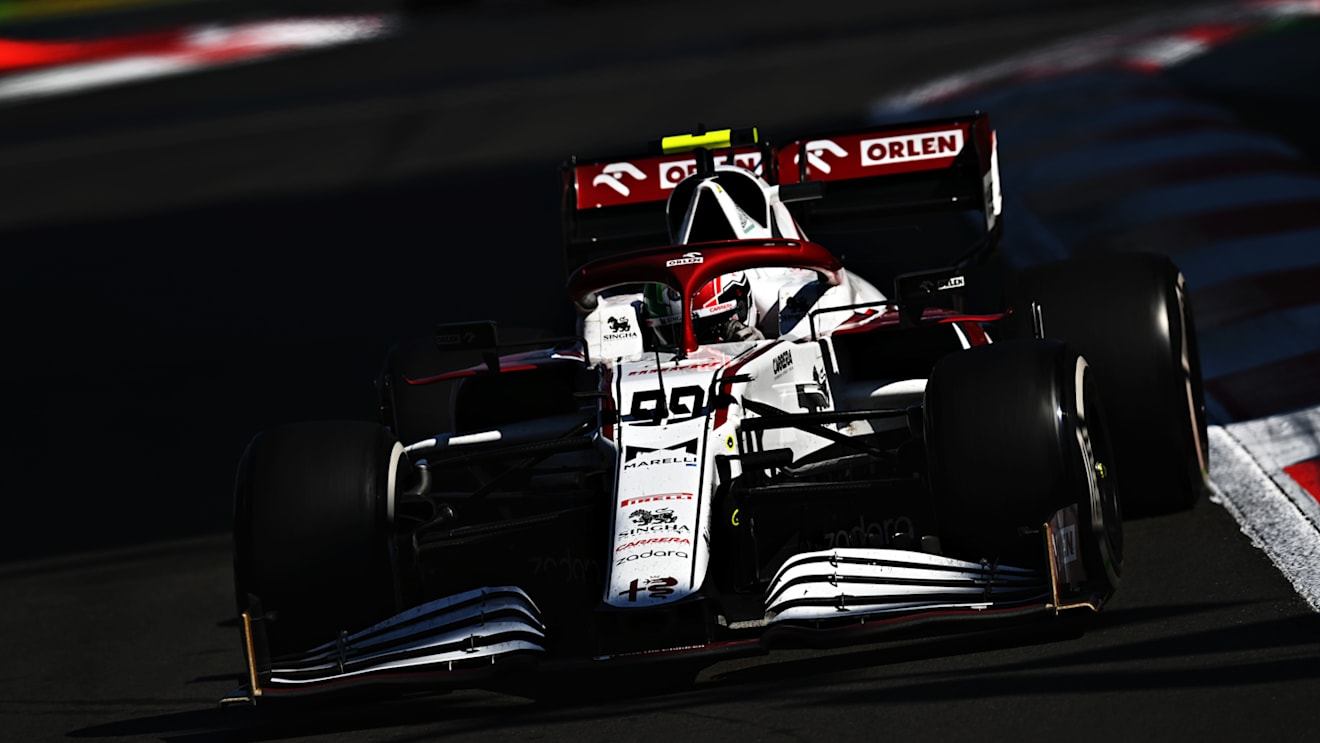 MEXICO CITY, MEXICO - NOVEMBER 07: Antonio Giovinazzi of Italy driving the (99) Alfa Romeo Racing C41 Ferrari during the F1 Grand Prix of Mexico at Autodromo Hermanos Rodriguez on November 07, 2021 in Mexico City, Mexico. (Photo by Clive Mason/Getty Images)