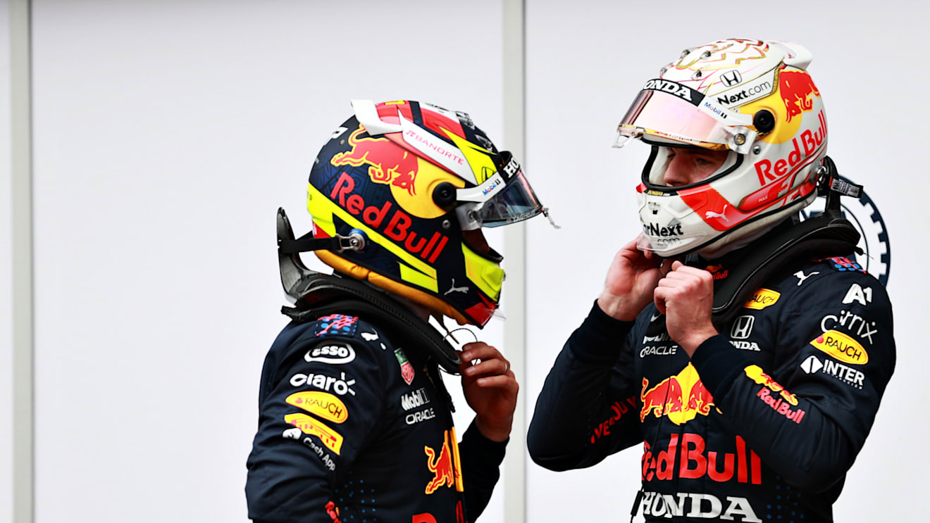 MONTE-CARLO, MONACO - MAY 22: Second place qualifier Max Verstappen of Netherlands and Red Bull Racing talks with Sergio Perez of Mexico and Red Bull Racing in parc ferme during qualifying for the F1 Grand Prix of Monaco at Circuit de Monaco on May 22, 2021 in Monte-Carlo, Monaco. (Photo by Mark Thompson/Getty Images)
