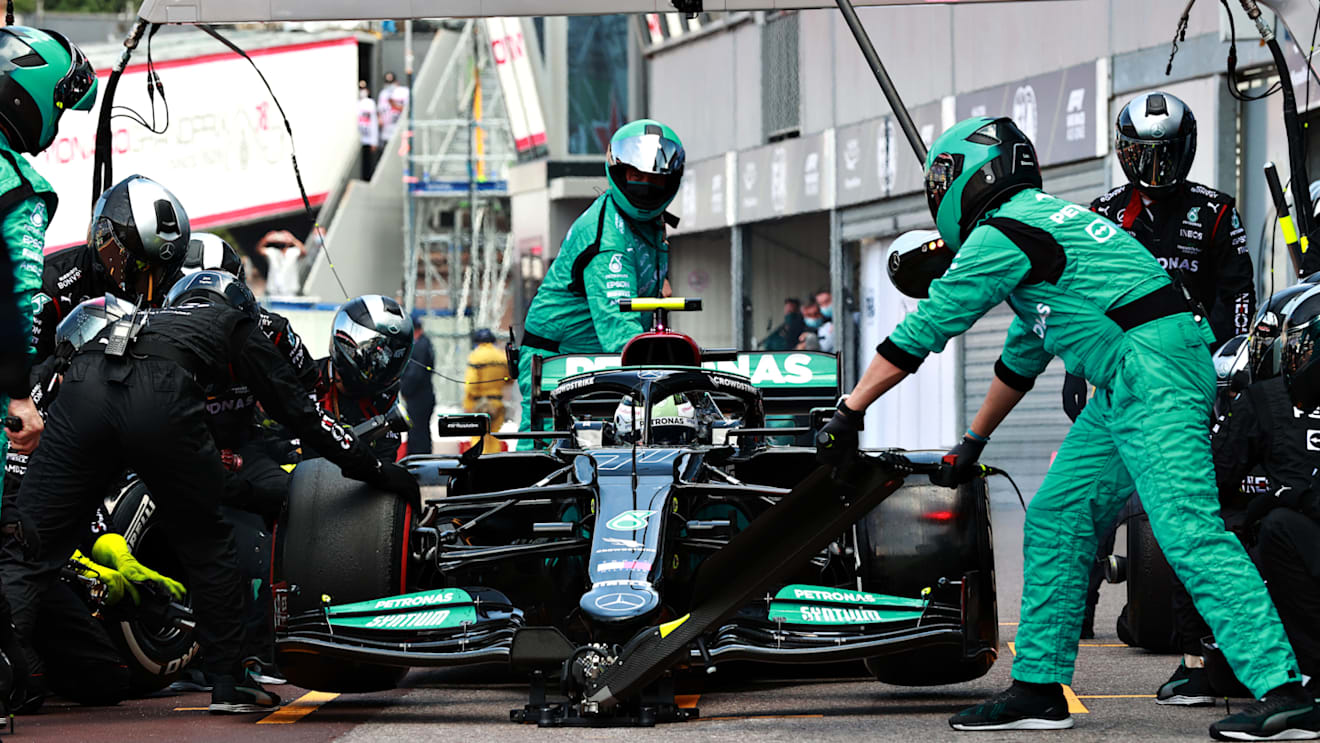 MONTE-CARLO, MONACO - MAY 23: Valtteri Bottas of Finland driving the (77) Mercedes AMG Petronas F1 Team Mercedes W12 makes a pitstop but his front right wheel is stuck on his car leading to his retirement from the race during the F1 Grand Prix of Monaco at Circuit de Monaco on May 23, 2021 in Monte-Carlo, Monaco. (Photo by Mark Thompson/Getty Images)