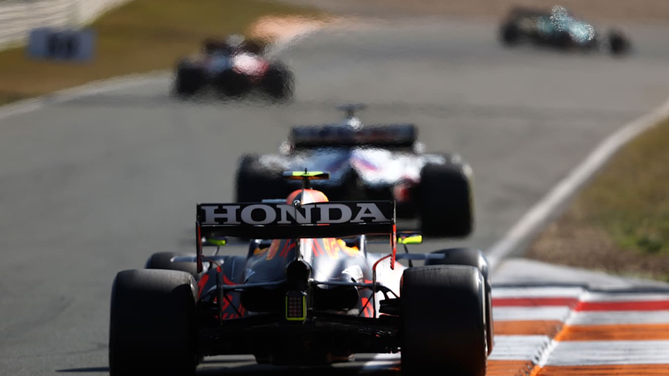 ZANDVOORT, NETHERLANDS - SEPTEMBER 05: Sergio Perez of Mexico driving the (11) Red Bull Racing RB16B Honda during the F1 Grand Prix of The Netherlands at Circuit Zandvoort on September 05, 2021 in Zandvoort, Netherlands. (Photo by Bryn Lennon/Getty Images)