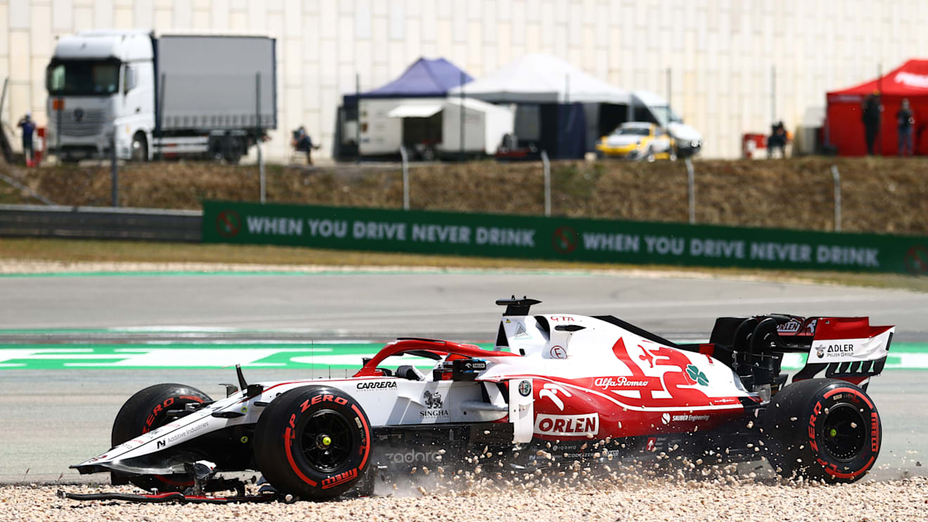 PORTIMAO, PORTUGAL - MAY 02: Kimi Raikkonen of Finland driving the (7) Alfa Romeo Racing C41 Ferrari in the gravel with a broken front wing during the F1 Grand Prix of Portugal at Autodromo Internacional Do Algarve on May 02, 2021 in Portimao, Portugal. (Photo by Bryn Lennon/Getty Images)