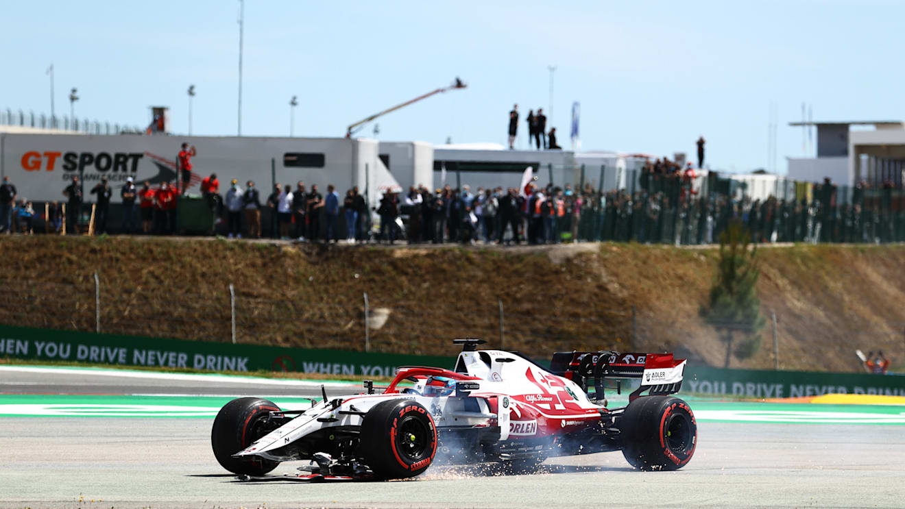 PORTIMAO, PORTUGAL - MAY 02: Kimi Raikkonen of Finland driving the (7) Alfa Romeo Racing C41 Ferrari runs wide with a broken front wing during the F1 Grand Prix of Portugal at Autodromo Internacional Do Algarve on May 02, 2021 in Portimao, Portugal. (Photo by Bryn Lennon/Getty Images)