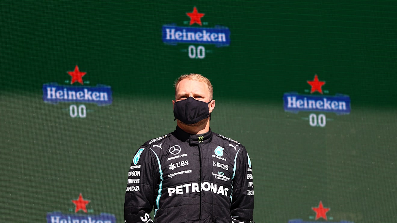 PORTIMAO, PORTUGAL - MAY 02: Third placed Valtteri Bottas of Finland and Mercedes GP celebrates on the podium during the F1 Grand Prix of Portugal at Autodromo Internacional Do Algarve on May 02, 2021 in Portimao, Portugal. (Photo by Bryn Lennon/Getty Images)