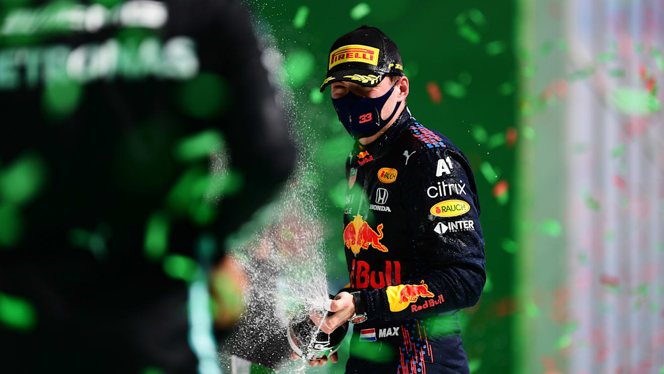 PORTIMAO, PORTUGAL - MAY 02: Second placed Max Verstappen of Netherlands and Red Bull Racing celebrates with sparkling wine on the podium during the F1 Grand Prix of Portugal at Autodromo Internacional Do Algarve on May 02, 2021 in Portimao, Portugal. (Photo by Mario Renzi - Formula 1/Formula 1 via Getty Images)