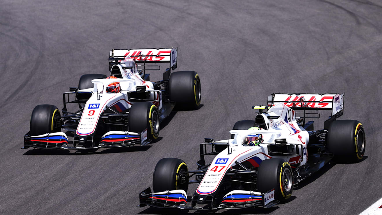 PORTIMAO, PORTUGAL - MAY 02: Mick Schumacher of Germany driving the (47) Haas F1 Team VF-21 Ferrari leads Nikita Mazepin of Russia driving the (9) Haas F1 Team VF-21 Ferrari on track during the F1 Grand Prix of Portugal at Autodromo Internacional Do Algarve on May 02, 2021 in Portimao, Portugal. (Photo by Lars Baron/Getty Images)