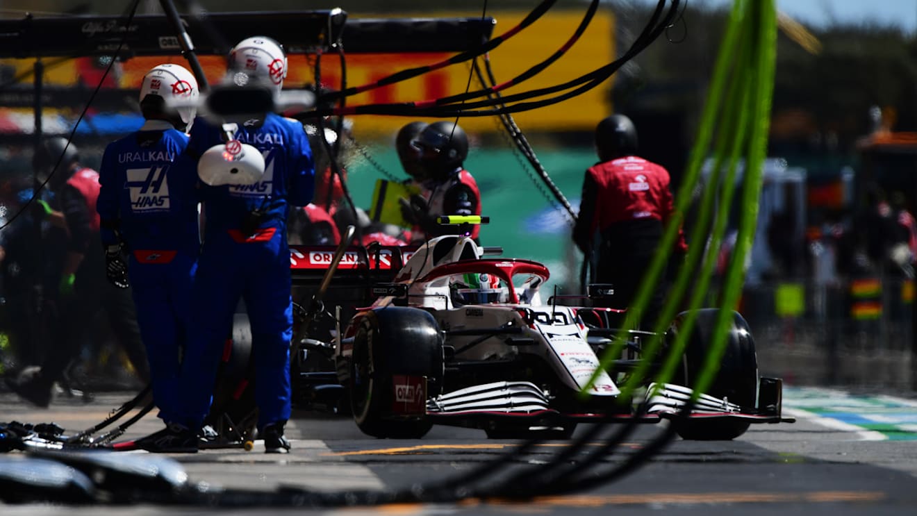 PORTIMAO, PORTUGAL - MAY 02: Antonio Giovinazzi of Italy driving the (99) Alfa Romeo Racing C41 Ferrari comes in for a tyre change during the F1 Grand Prix of Portugal at Autodromo Internacional Do Algarve on May 02, 2021 in Portimao, Portugal. (Photo by Mario Renzi - Formula 1/Formula 1 via Getty Images)
