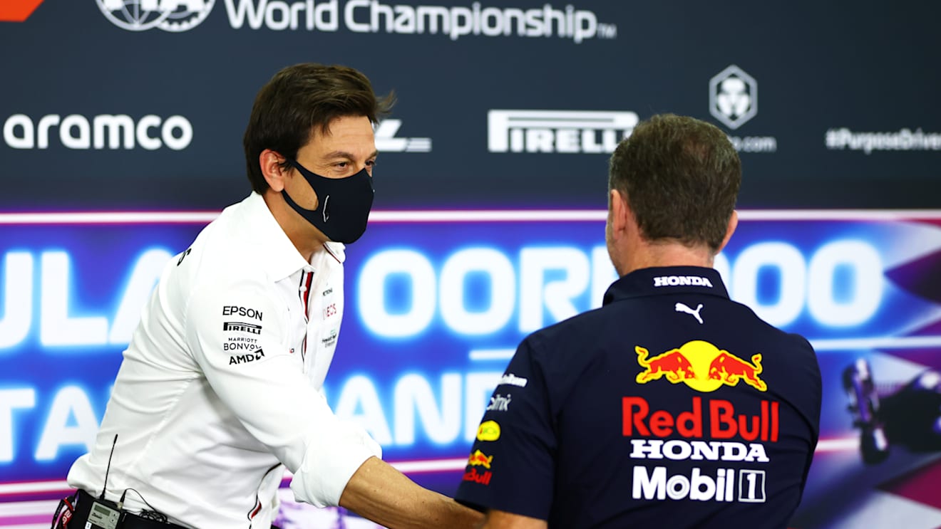 DOHA, QATAR - NOVEMBER 19: Mercedes GP Executive Director Toto Wolff and Red Bull Racing Team Principal Christian Horner talk in the Team Principals Press Conference during practice ahead of the F1 Grand Prix of Qatar at Losail International Circuit on November 19, 2021 in Doha, Qatar. (Photo by Dan Istitene/Getty Images)