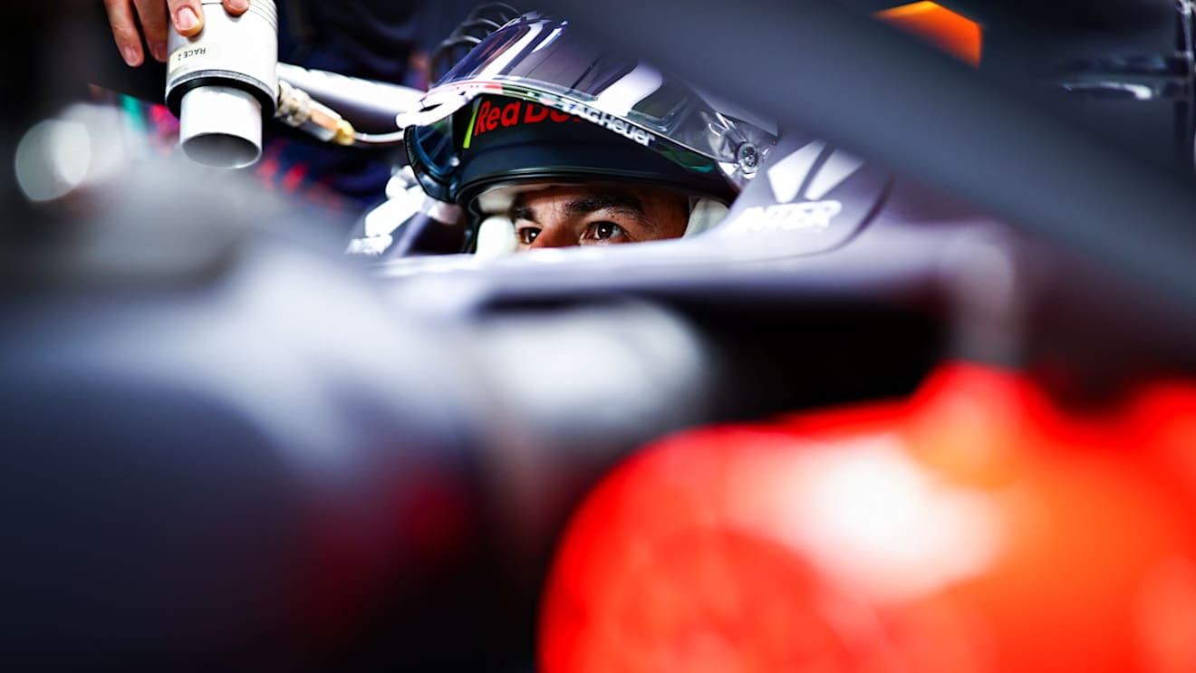 DOHA, QATAR - NOVEMBER 19: Sergio Perez of Mexico and Red Bull Racing prepares to drive in the garage during practice ahead of the F1 Grand Prix of Qatar at Losail International Circuit on November 19, 2021 in Doha, Qatar. (Photo by Mark Thompson/Getty Images)