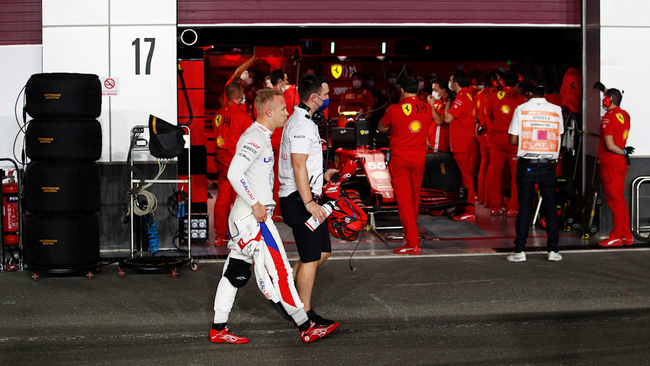 DOHA, QATAR - NOVEMBER 20: Nikita Mazepin of Russia and Haas F1 walksin the Pitlane  during qualifying ahead of the F1 Grand Prix of Qatar at Losail International Circuit on November 20, 2021 in Doha, Qatar. (Photo by Hamad I Mohammed - Pool/Getty Images)
