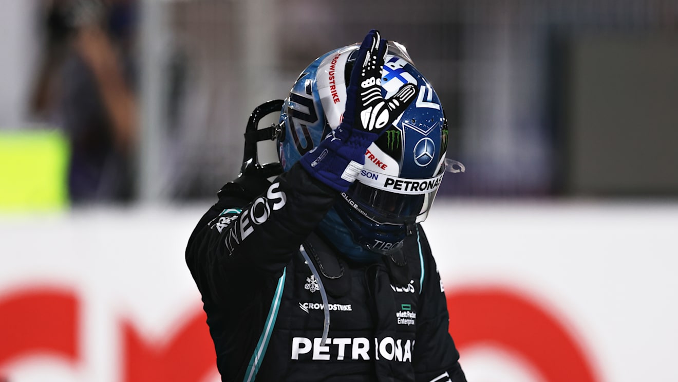DOHA, QATAR - NOVEMBER 20: Third placed Valtteri Bottas of Finland and Mercedes GP celebrates in parc ferme during qualifying ahead of the F1 Grand Prix of Qatar at Losail International Circuit on November 20, 2021 in Doha, Qatar. (Photo by Lars Baron/Getty Images)