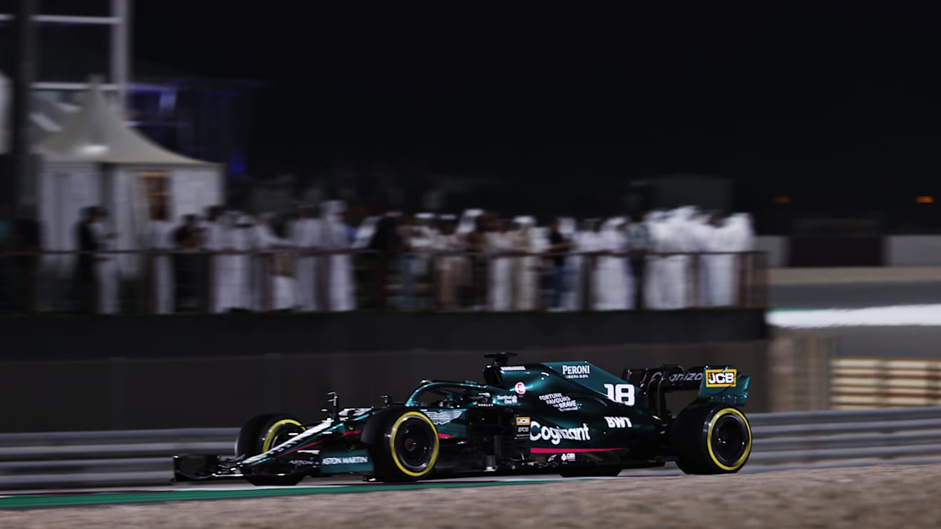 DOHA, QATAR - NOVEMBER 21: Lance Stroll of Canada driving the (18) Aston Martin AMR21 Mercedes during the F1 Grand Prix of Qatar at Losail International Circuit on November 21, 2021 in Doha, Qatar. (Photo by Lars Baron/Getty Images)