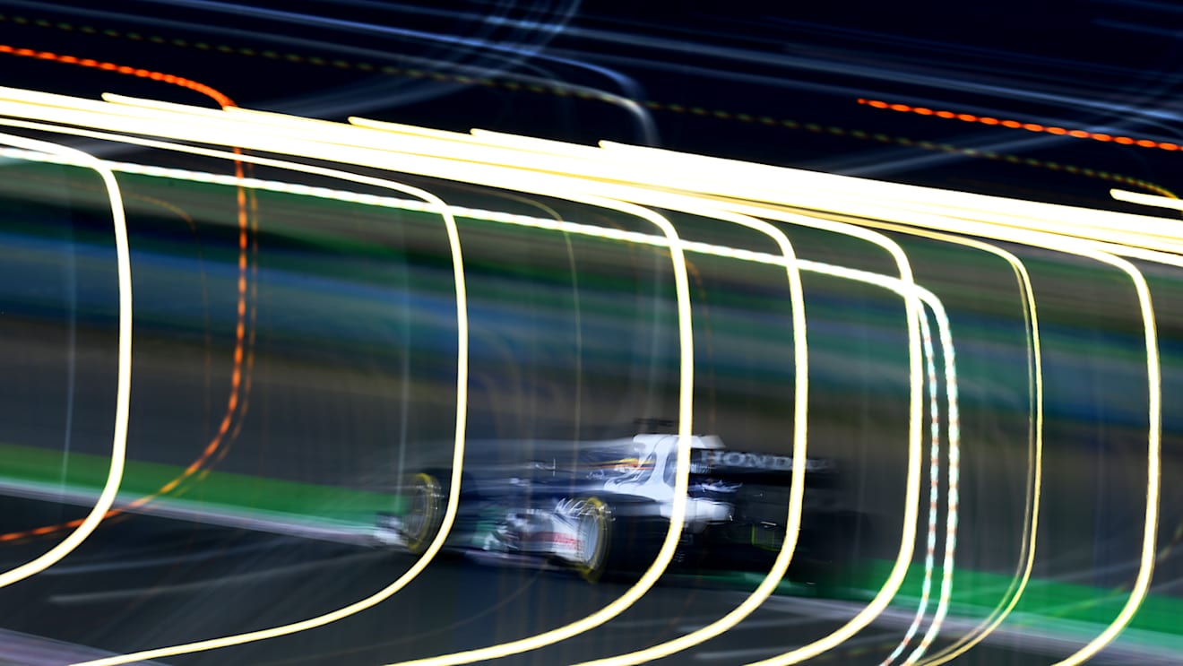 DOHA, QATAR - NOVEMBER 21: Yuki Tsunoda of Japan driving the (22) Scuderia AlphaTauri AT02 Honda on track during the F1 Grand Prix of Qatar at Losail International Circuit on November 21, 2021 in Doha, Qatar. (Photo by Clive Mason/Getty Images)