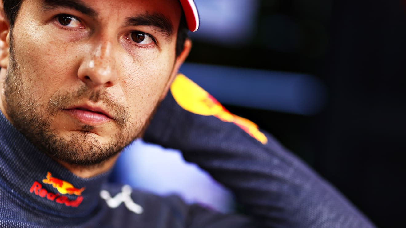 DOHA, QATAR - NOVEMBER 21: Sergio Perez of Mexico and Red Bull Racing prepares to drive in the garage before the F1 Grand Prix of Qatar at Losail International Circuit on November 21, 2021 in Doha, Qatar. (Photo by Mark Thompson/Getty Images)