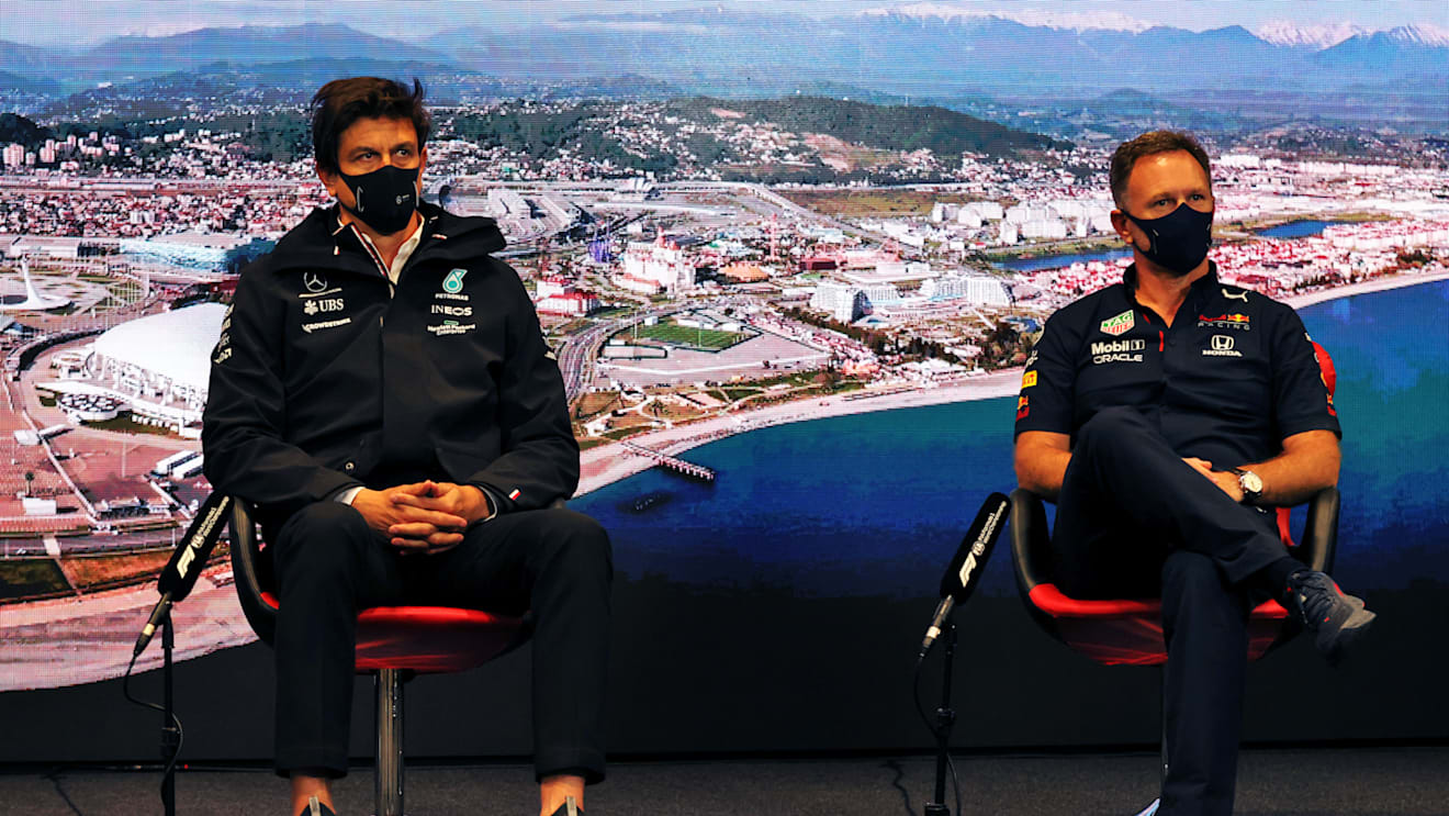 SOCHI, RUSSIA - SEPTEMBER 24: Mercedes GP Executive Director Toto Wolff and Red Bull Racing Team Principal Christian Horner talk in the Team Principals Press Conference during practice ahead of the F1 Grand Prix of Russia at Sochi Autodrom on September 24, 2021 in Sochi, Russia. (Photo by XPB - Pool/Getty Images)