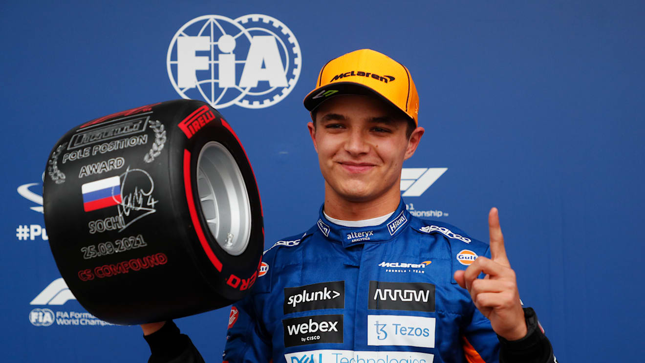 SOCHI, RUSSIA - SEPTEMBER 25: Pole position qualifier Lando Norris of Great Britain and McLaren F1 celebrates in parc ferme during qualifying ahead of the F1 Grand Prix of Russia at Sochi Autodrom on September 25, 2021 in Sochi, Russia. (Photo by Yuri Kochetkov - Pool/Getty Images)