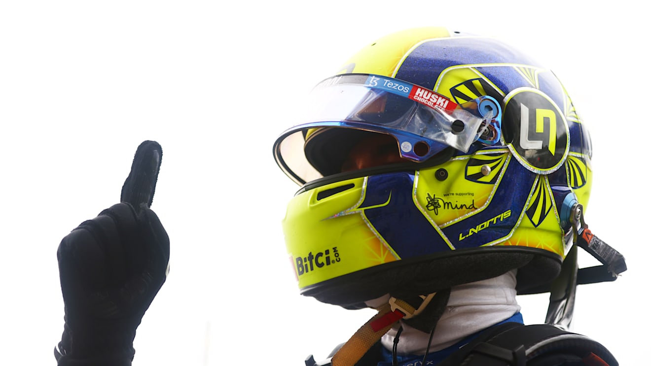 SOCHI, RUSSIA - SEPTEMBER 25: Pole position qualifier Lando Norris of Great Britain and McLaren F1 celebrates in parc ferme during qualifying ahead of the F1 Grand Prix of Russia at Sochi Autodrom on September 25, 2021 in Sochi, Russia. (Photo by Dan Istitene - Formula 1/Formula 1 via Getty Images)