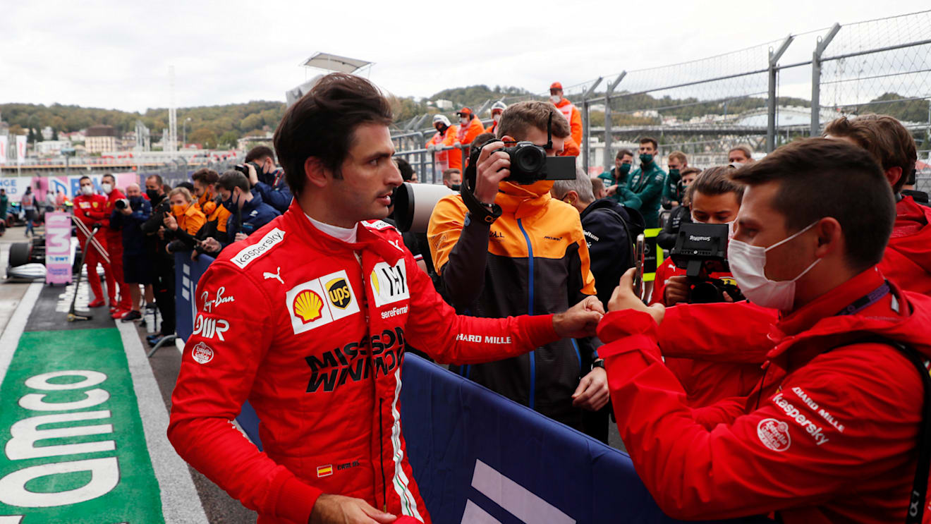SOCHI, RUSSIA - SEPTEMBER 25: Second place qualifier Carlos Sainz of Spain and Ferrari celebrates in parc ferme during qualifying ahead of the F1 Grand Prix of Russia at Sochi Autodrom on September 25, 2021 in Sochi, Russia. (Photo by Yuri Kochetkov - Pool/Getty Images)