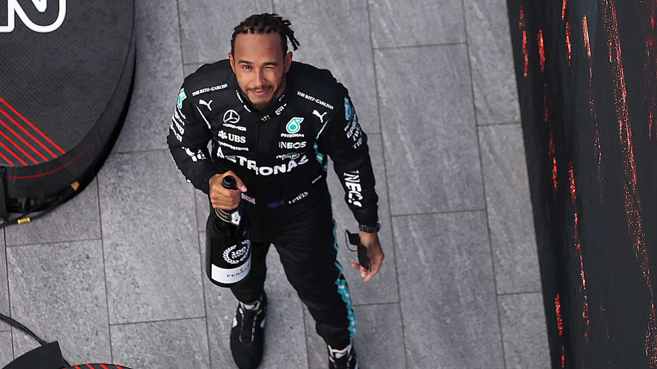 SOCHI, RUSSIA - SEPTEMBER 26: Race winner Lewis Hamilton of Great Britain and Mercedes GP celebrates on the podium during the F1 Grand Prix of Russia at Sochi Autodrom on September 26, 2021 in Sochi, Russia. (Photo by Lars Baron - Formula 1/Formula 1 via Getty Images)