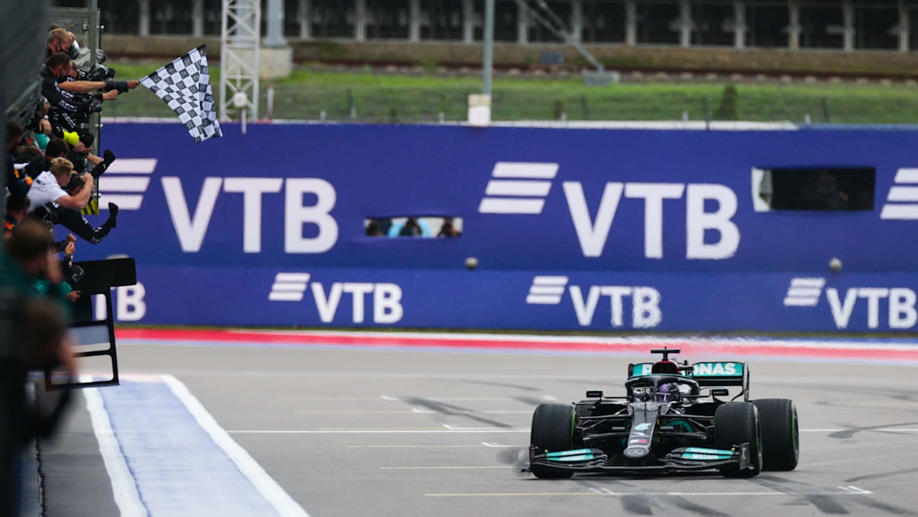 SOCHI, RUSSIA - SEPTEMBER 26: Lewis Hamilton of Mercedes and Great Britain wins his 100th Grand Prix during the F1 Grand Prix of Russia at Sochi Autodrom on September 26, 2021 in Sochi, Russia. (Photo by Peter Fox/Getty Images)