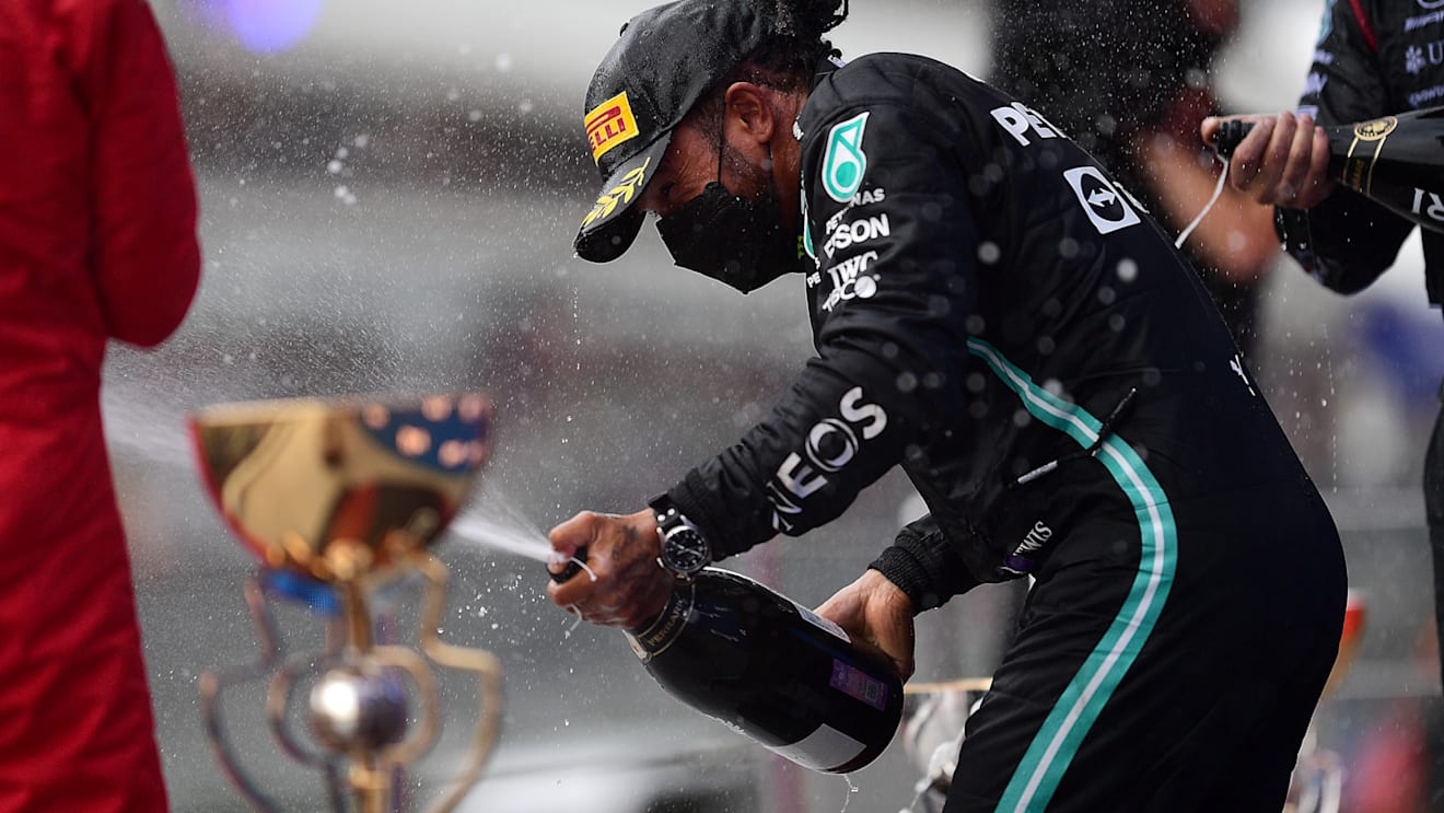 SOCHI, RUSSIA - SEPTEMBER 26: Race winner Lewis Hamilton of Great Britain and Mercedes GP celebrates on the podium during the F1 Grand Prix of Russia at Sochi Autodrom on September 26, 2021 in Sochi, Russia. (Photo by Mario Renzi - Formula 1/Formula 1 via Getty Images)