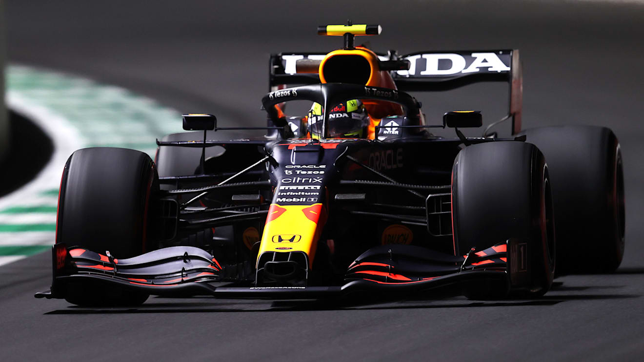 JEDDAH, SAUDI ARABIA - DECEMBER 03:Sergio Perez of Mexico driving the (11) Red Bull Racing RB16B Honda  during practice ahead of the F1 Grand Prix of Saudi Arabia at Jeddah Corniche Circuit on December 03, 2021 in Jeddah, Saudi Arabia. (Photo by Lars Baron/Getty Images)