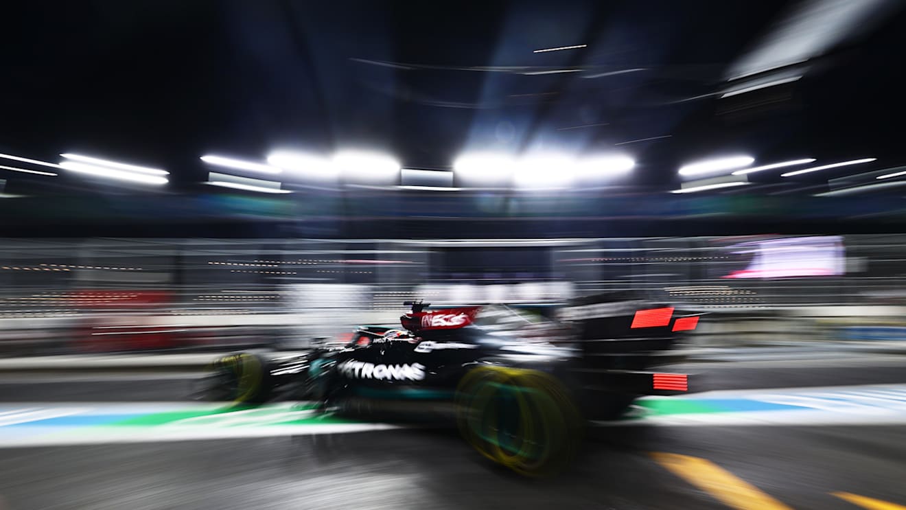 JEDDAH, SAUDI ARABIA - DECEMBER 03: Lewis Hamilton of Great Britain driving the (44) Mercedes AMG Petronas F1 Team Mercedes W12 leaves the garage during practice ahead of the F1 Grand Prix of Saudi Arabia at Jeddah Corniche Circuit on December 03, 2021 in Jeddah, Saudi Arabia. (Photo by Mark Thompson/Getty Images)