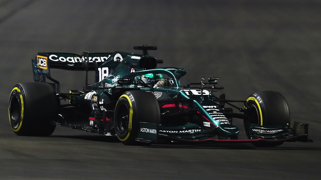 JEDDAH, SAUDI ARABIA - DECEMBER 05: Lance Stroll of Canada driving the (18) Aston Martin AMR21 Mercedes during the F1 Grand Prix of Saudi Arabia at Jeddah Corniche Circuit on December 05, 2021 in Jeddah, Saudi Arabia. (Photo by Joe Portlock - Formula 1/Formula 1 via Getty Images)