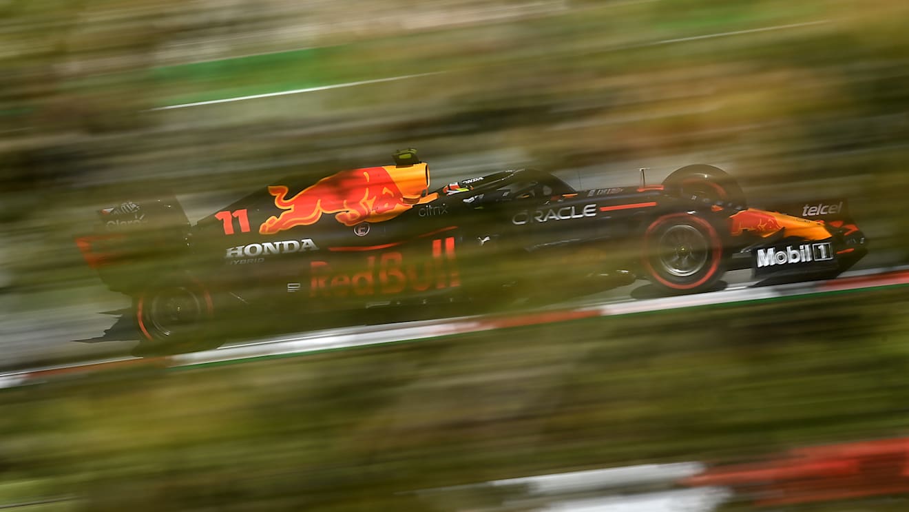 BARCELONA, SPAIN - MAY 07: Sergio Perez of Mexico driving the (11) Red Bull Racing RB16B Honda during practice for the F1 Grand Prix of Spain at Circuit de Barcelona-Catalunya on May 07, 2021 in Barcelona, Spain. (Photo by Clive Mason - Formula 1/Formula 1 via Getty Images)