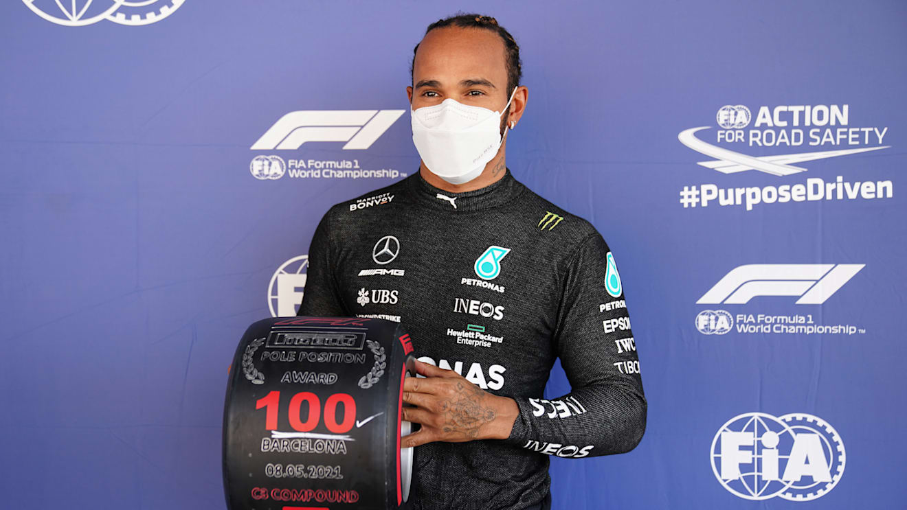 BARCELONA, SPAIN - MAY 08: Pole position qualifier Lewis Hamilton of Great Britain and Mercedes GP celebrates with his pole position award in parc ferme after qualifying for the F1 Grand Prix of Spain at Circuit de Barcelona-Catalunya on May 08, 2021 in Barcelona, Spain. (Photo by Emilio Morenatti - Pool/Getty Images)