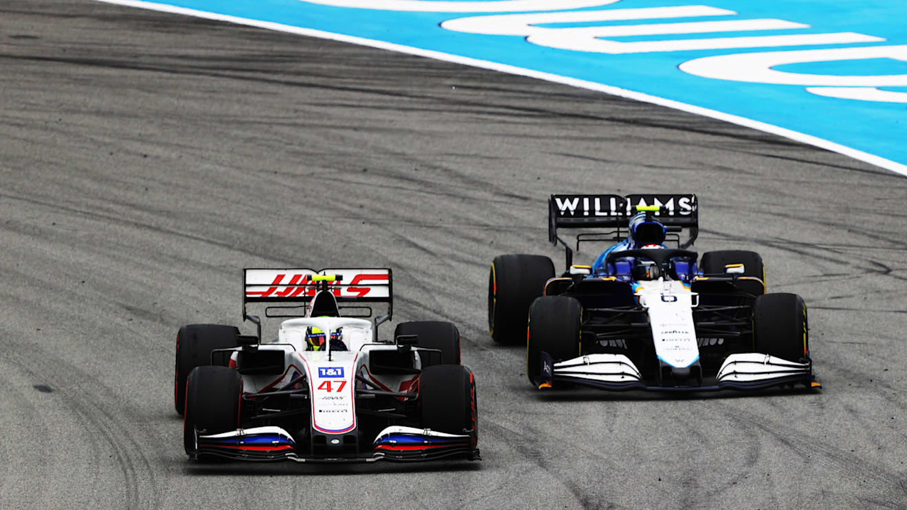 BARCELONA, SPAIN - MAY 09: Mick Schumacher of Germany driving the (47) Haas F1 Team VF-21 Ferrari leads Nicholas Latifi of Canada driving the (6) Williams Racing FW43B Mercedes on track during the F1 Grand Prix of Spain at Circuit de Barcelona-Catalunya on May 09, 2021 in Barcelona, Spain. (Photo by Bryn Lennon/Getty Images)