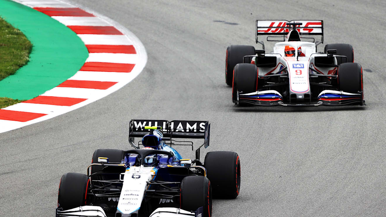 BARCELONA, SPAIN - MAY 09: Nicholas Latifi of Canada driving the (6) Williams Racing FW43B Mercedes leads Nikita Mazepin of Russia driving the (9) Haas F1 Team VF-21 Ferrari on track during the F1 Grand Prix of Spain at Circuit de Barcelona-Catalunya on May 09, 2021 in Barcelona, Spain. (Photo by Bryn Lennon/Getty Images)
