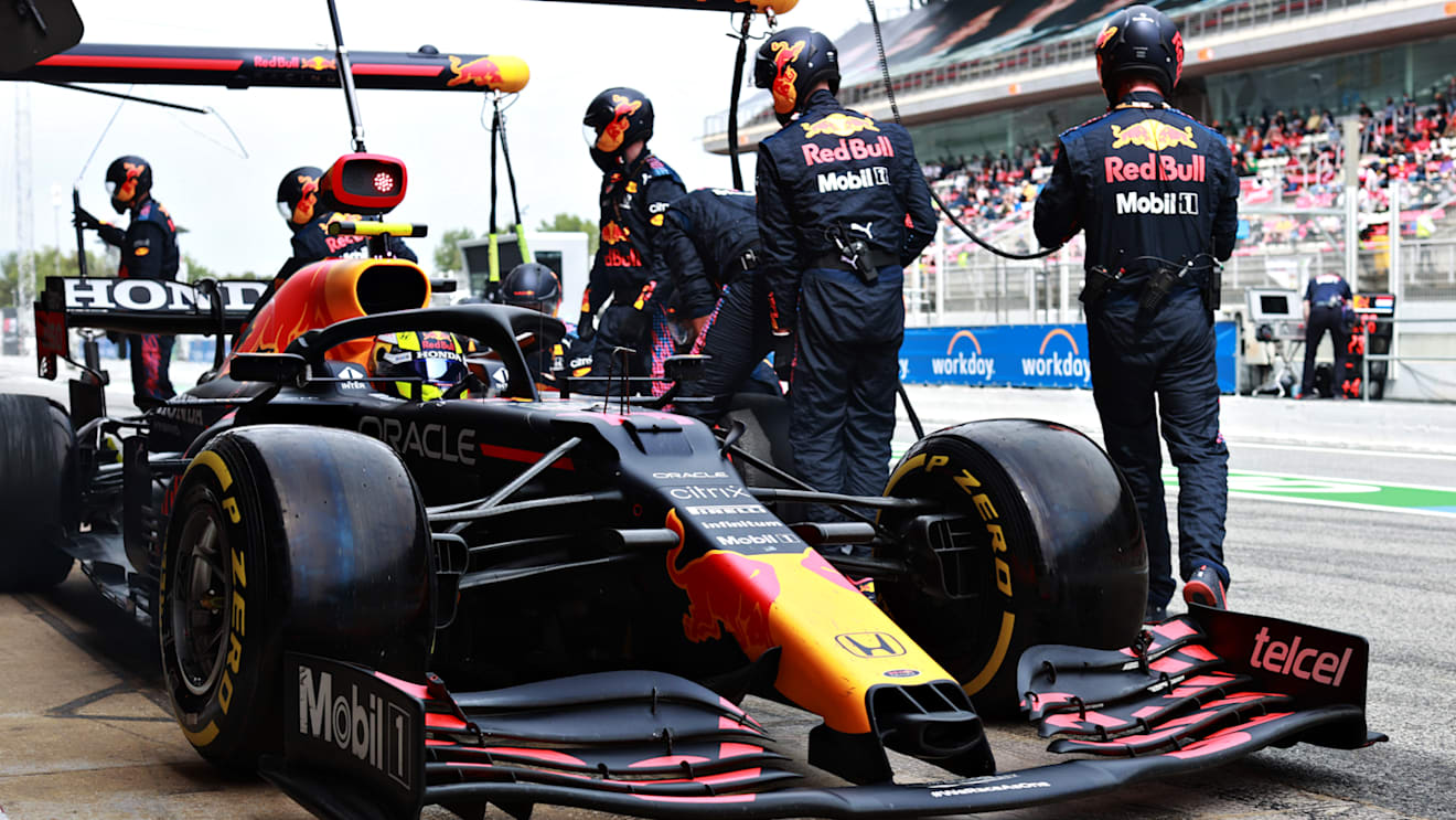 BARCELONA, SPAIN - MAY 09: Sergio Perez of Mexico driving the (11) Red Bull Racing RB16B Honda makes a pitstop during the F1 Grand Prix of Spain at Circuit de Barcelona-Catalunya on May 09, 2021 in Barcelona, Spain. (Photo by Mark Thompson/Getty Images)