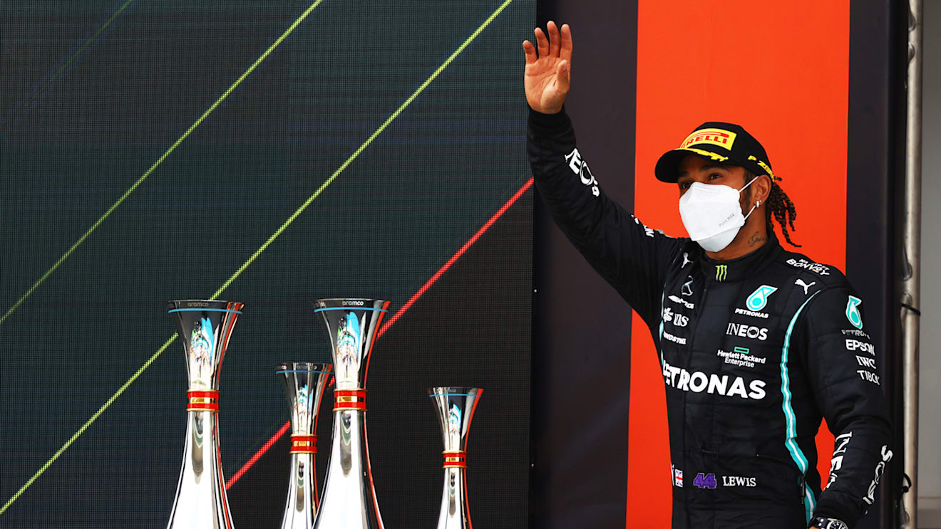 BARCELONA, SPAIN - MAY 09: Race winner Lewis Hamilton of Great Britain and Mercedes GP celebrates on the podium during the F1 Grand Prix of Spain at Circuit de Barcelona-Catalunya on May 09, 2021 in Barcelona, Spain. (Photo by Bryn Lennon/Getty Images)
