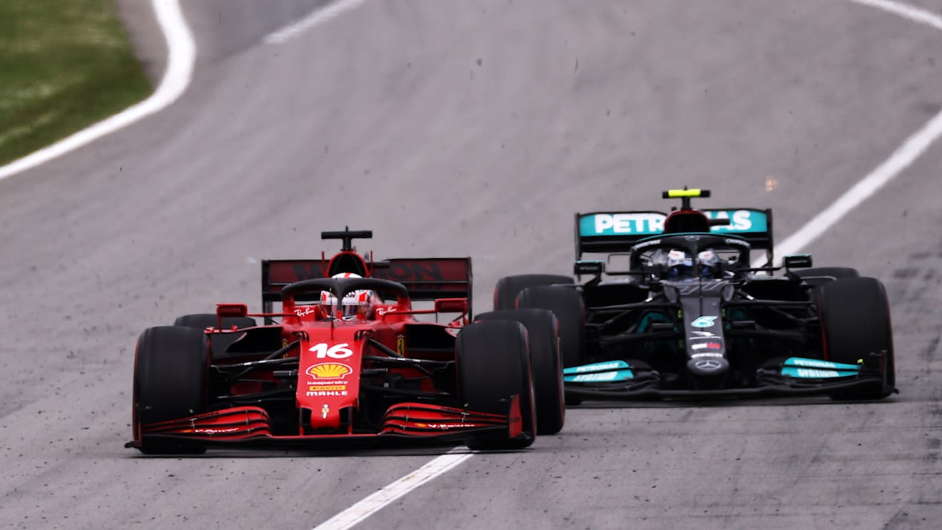 BARCELONA, SPAIN - MAY 09: Charles Leclerc of Monaco driving the (16) Scuderia Ferrari SF21 leads Valtteri Bottas of Finland driving the (77) Mercedes AMG Petronas F1 Team Mercedes W12 on track during the F1 Grand Prix of Spain at Circuit de Barcelona-Catalunya on May 09, 2021 in Barcelona, Spain. (Photo by Lars Baron/Getty Images)
