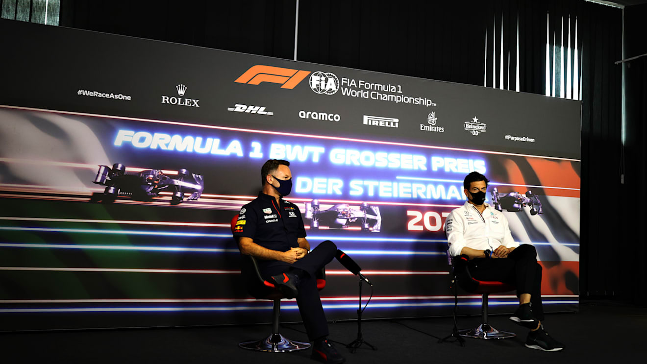 SPIELBERG, AUSTRIA - JUNE 25: Red Bull Racing Team Principal Christian Horner and Mercedes GP Executive Director Toto Wolff talk in a press conference  during practice ahead of the F1 Grand Prix of Styria at Red Bull Ring on June 25, 2021 in Spielberg, Austria. (Photo by Bryn Lennon/Getty Images)