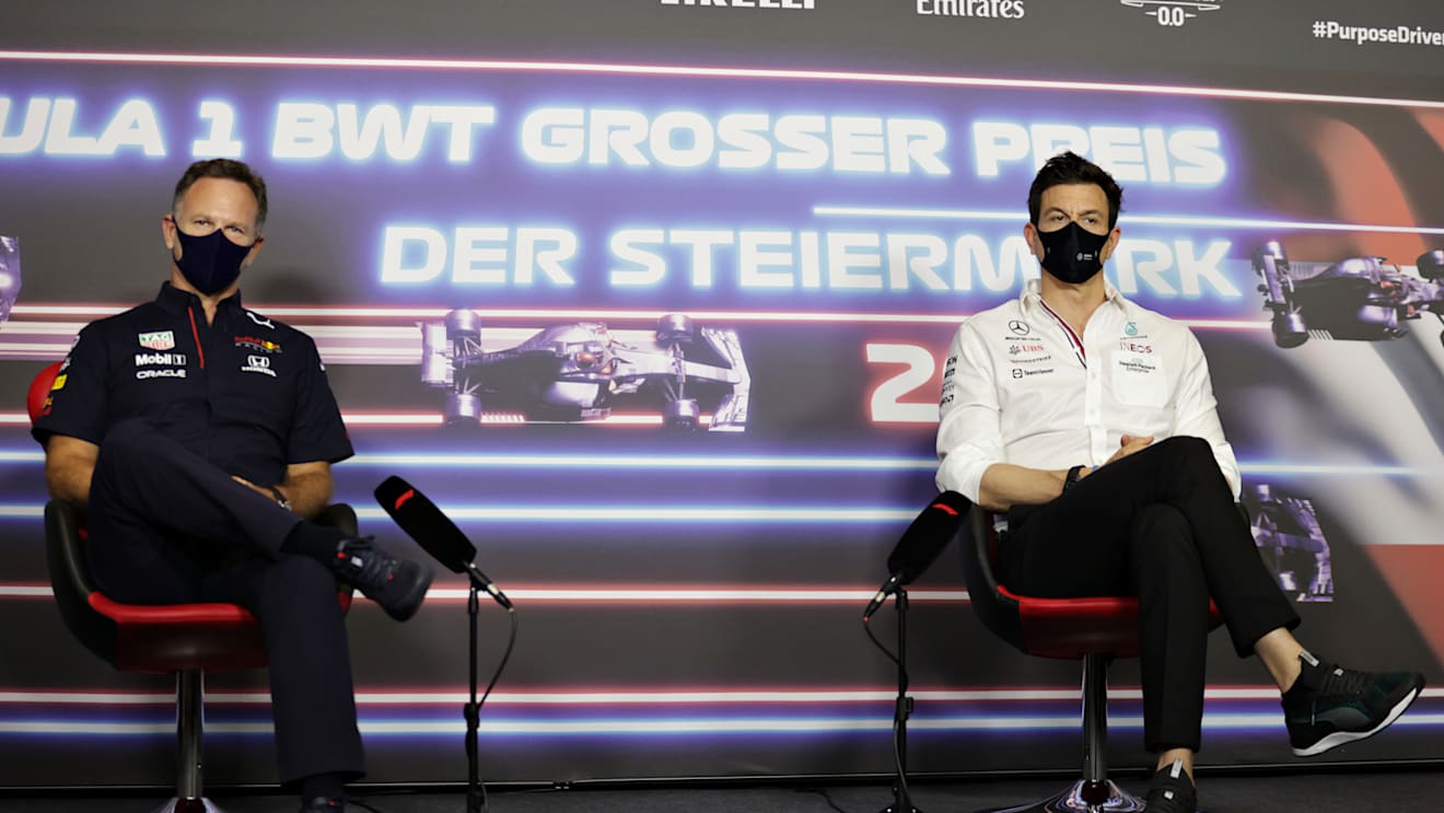 SPIELBERG, AUSTRIA - JUNE 25: Red Bull Racing Team Principal Christian Horner and Mercedes GP Executive Director Toto Wolff talk in a press conference  during practice ahead of the F1 Grand Prix of Styria at Red Bull Ring on June 25, 2021 in Spielberg, Austria. (Photo by Bryn Lennon/Getty Images)