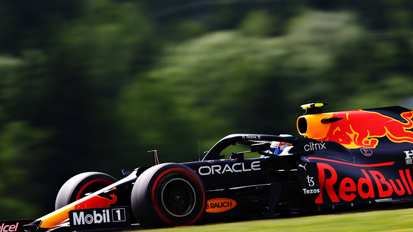 SPIELBERG, AUSTRIA - JUNE 25: Sergio Perez of Mexico driving the (11) Red Bull Racing RB16B Honda on track during practice ahead of the F1 Grand Prix of Styria at Red Bull Ring on June 25, 2021 in Spielberg, Austria. (Photo by Clive Rose/Getty Images)
