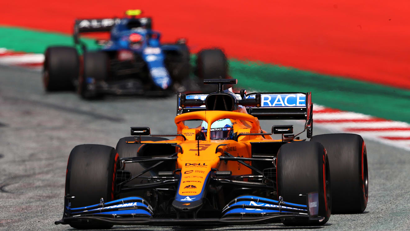 SPIELBERG, AUSTRIA - JUNE 25: Daniel Ricciardo of Australia driving the (3) McLaren F1 Team MCL35M Mercedes leads Esteban Ocon of France driving the (31) Alpine A521 Renault on track during practice ahead of the F1 Grand Prix of Styria at Red Bull Ring on June 25, 2021 in Spielberg, Austria. (Photo by Bryn Lennon/Getty Images)